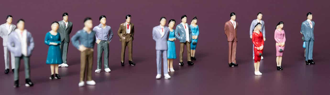 Game figurines in groups on a purple background