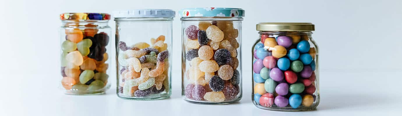 4 jars with different sweets