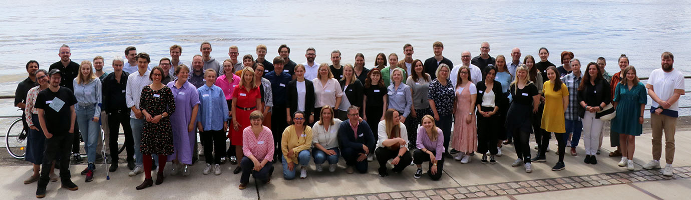 61 employees in the sunlight by the Elbe, June 2022